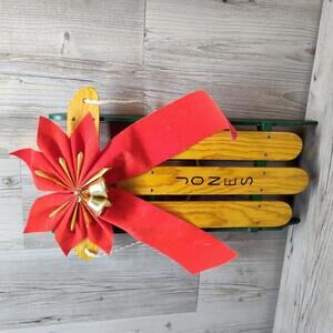 Handcrafted Wooden Sled with Red Bow and Bells Christmas Decoration JONES